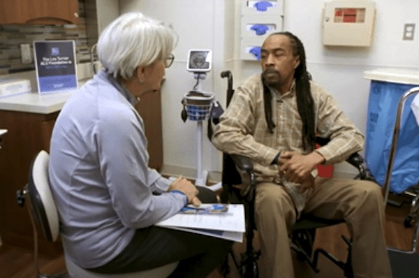 A patient talks to a health care professional.