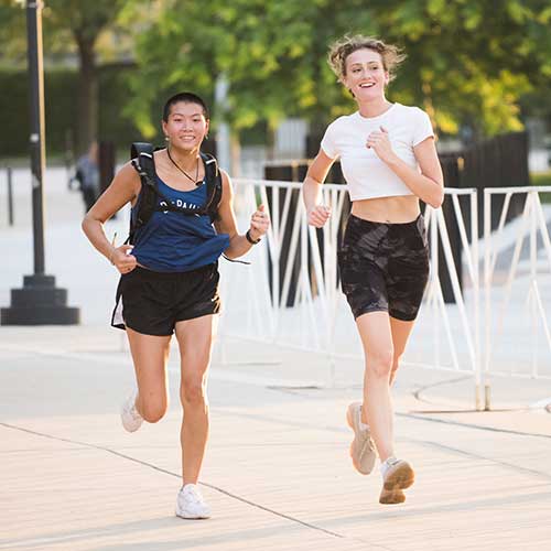 Two runners at an ALS fundraising 5K in 2022