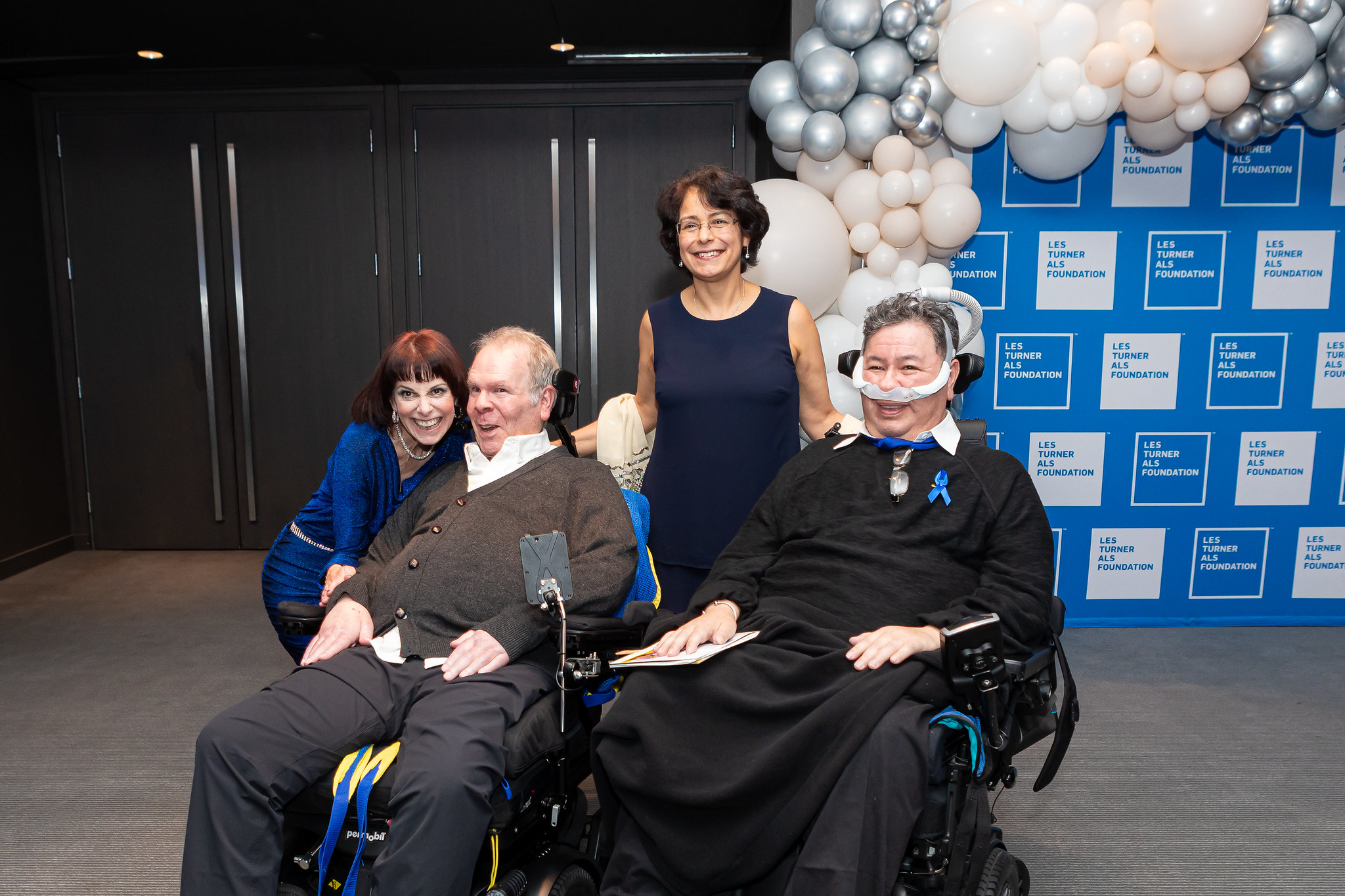 Gala attendees posing for a photo