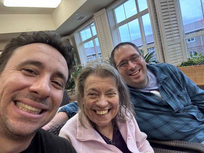 Marc Davidson, his mom Chris, and brother Eric